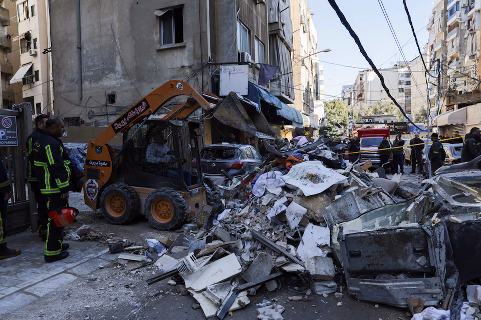 Israel pounds Beirut suburbs after Hezbollah fires volley of rockets