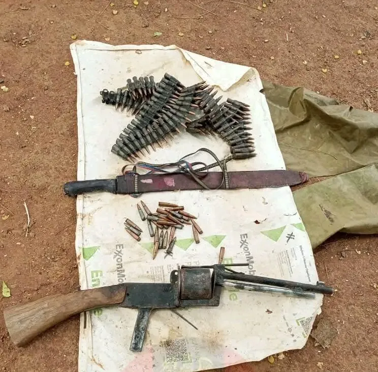 Recovered weapons and ammunition from the scene.