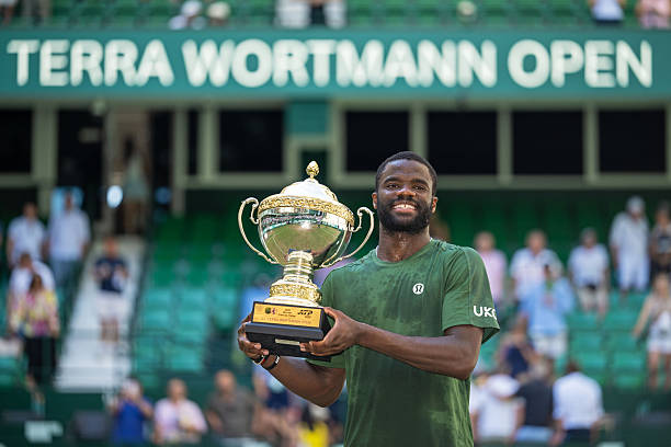 Romans 8:18: Tiafoe gives Glory to God after Halle Title