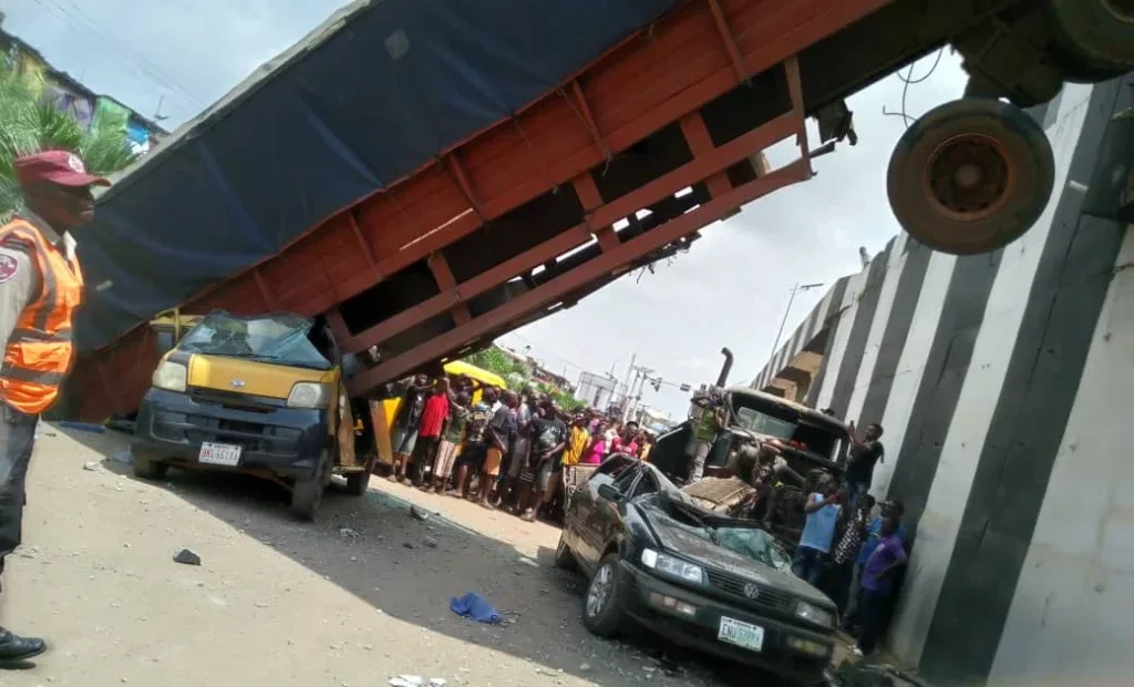 Two Injured as Lorry Falls From Br