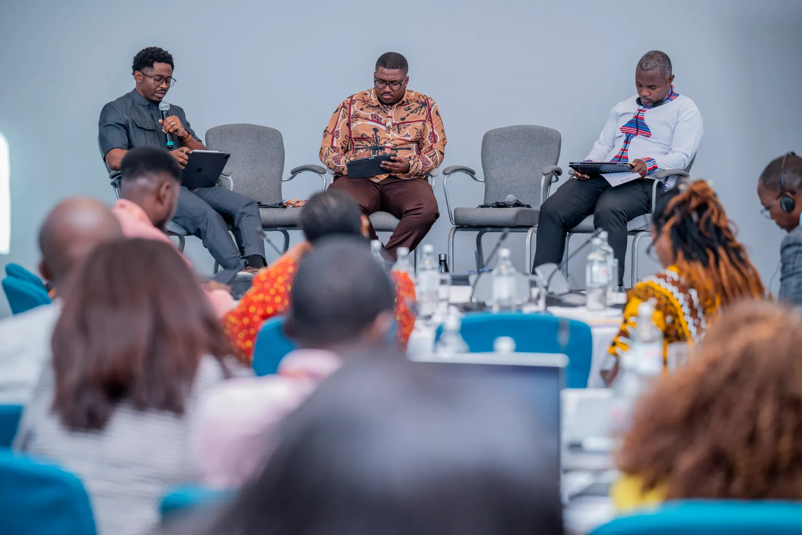 Second photo: Koaile Monaheng of Greenpeace Africa, John Maketo of the Zimbabwe Coalition on Debt and Development (ZIMCODD), and Ishmael Zulu of the Tax Justice Network Africa (TJNA).