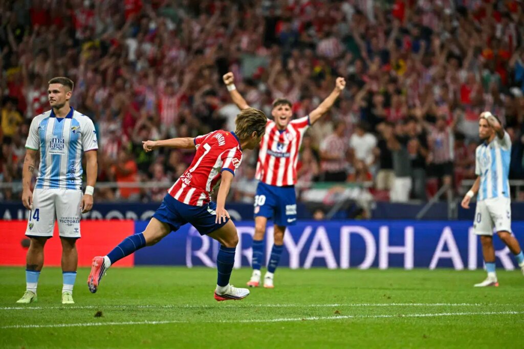 Atletico open La Liga campaign with win over Malaga