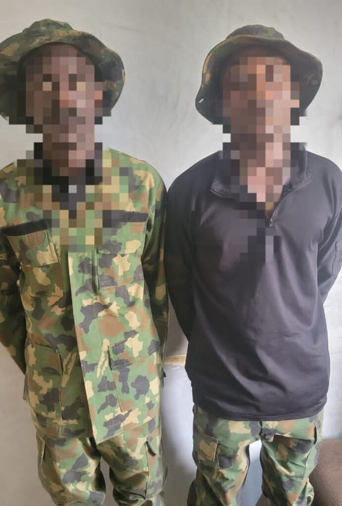 Two arrested for allegedly impersonating soldiers years after leaving military school
