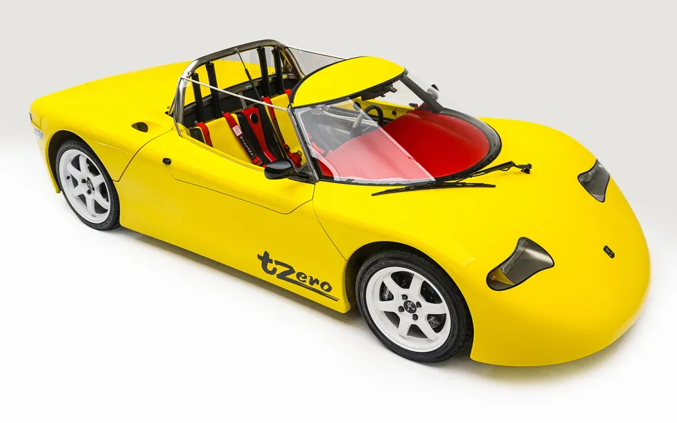 A two-seat yellow roadster.