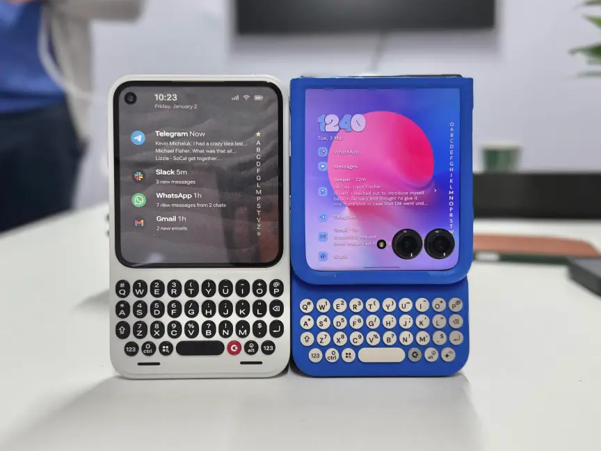 A Clicks Communicator next to a Motorola Razr in a Clicks Keyboard case