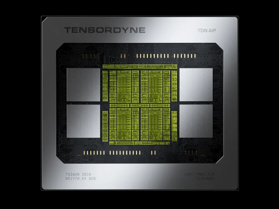 TENSORDYNE TDN AIP chip with central green processor cores on black board