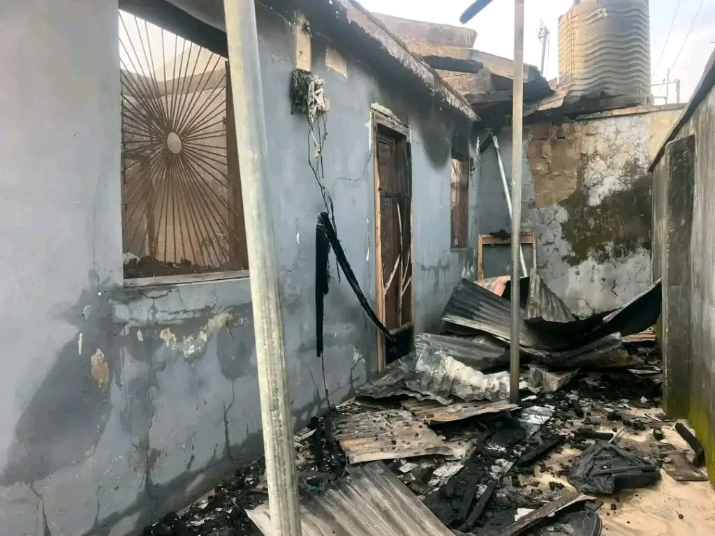 damaged residential buildings and car